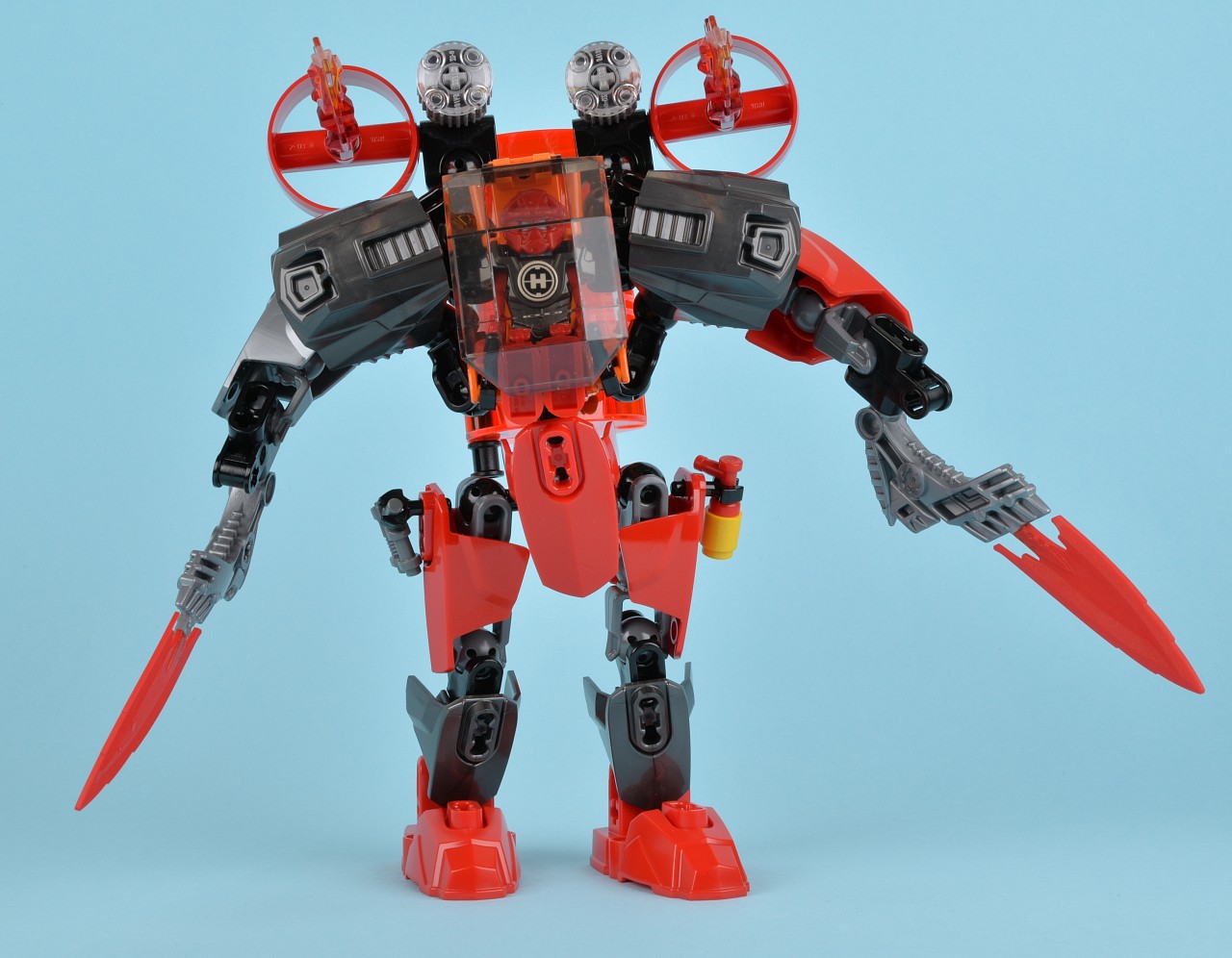 a close - up of an action figure with large tools