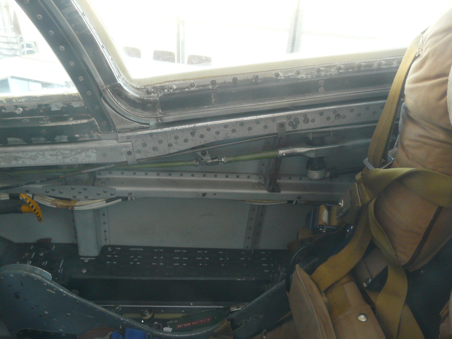 the inside of a vehicle showing the door and windows
