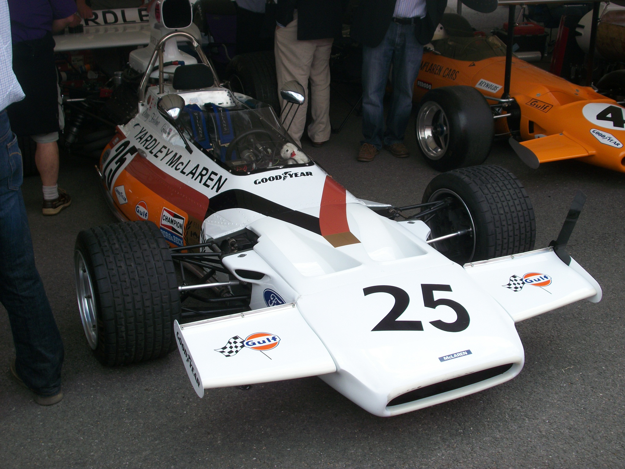 a racing car with numbers on the front of it