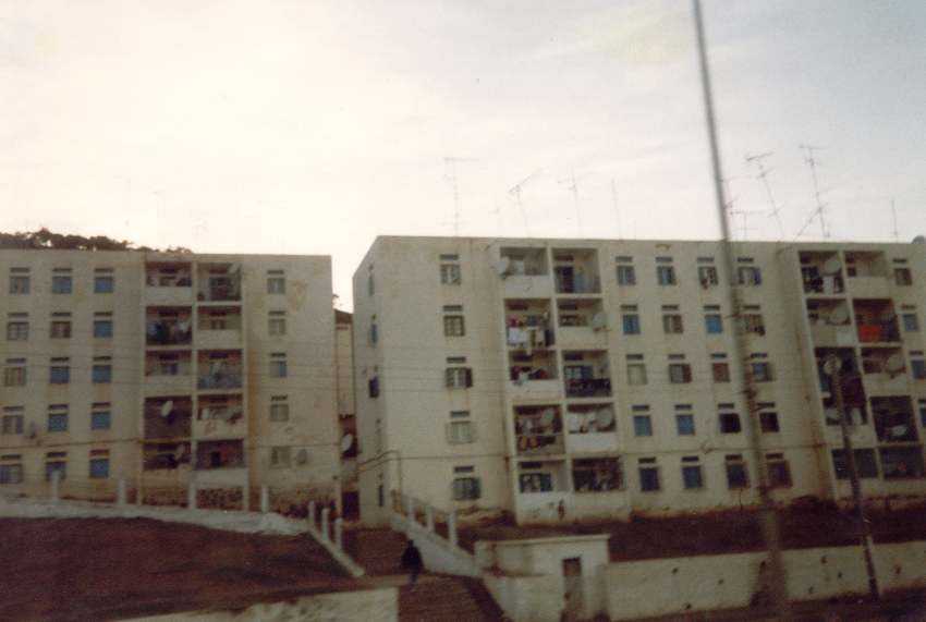 an old city block, with multiple windows