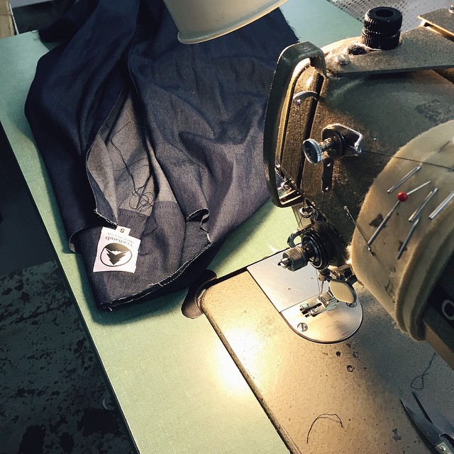 a view of a sewing machine and some clothes