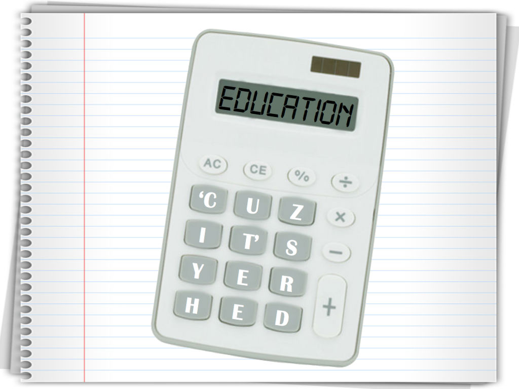 a calculator is placed on top of a page that says education