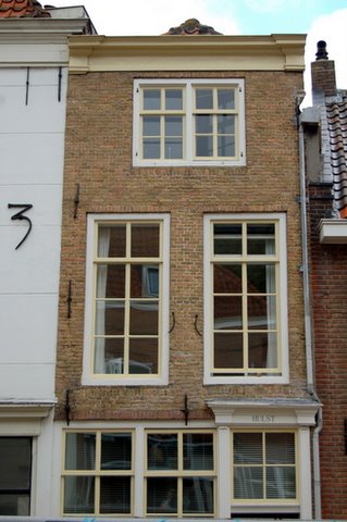 the window and doors of an old building