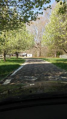 a view of the road in the distance from inside the car