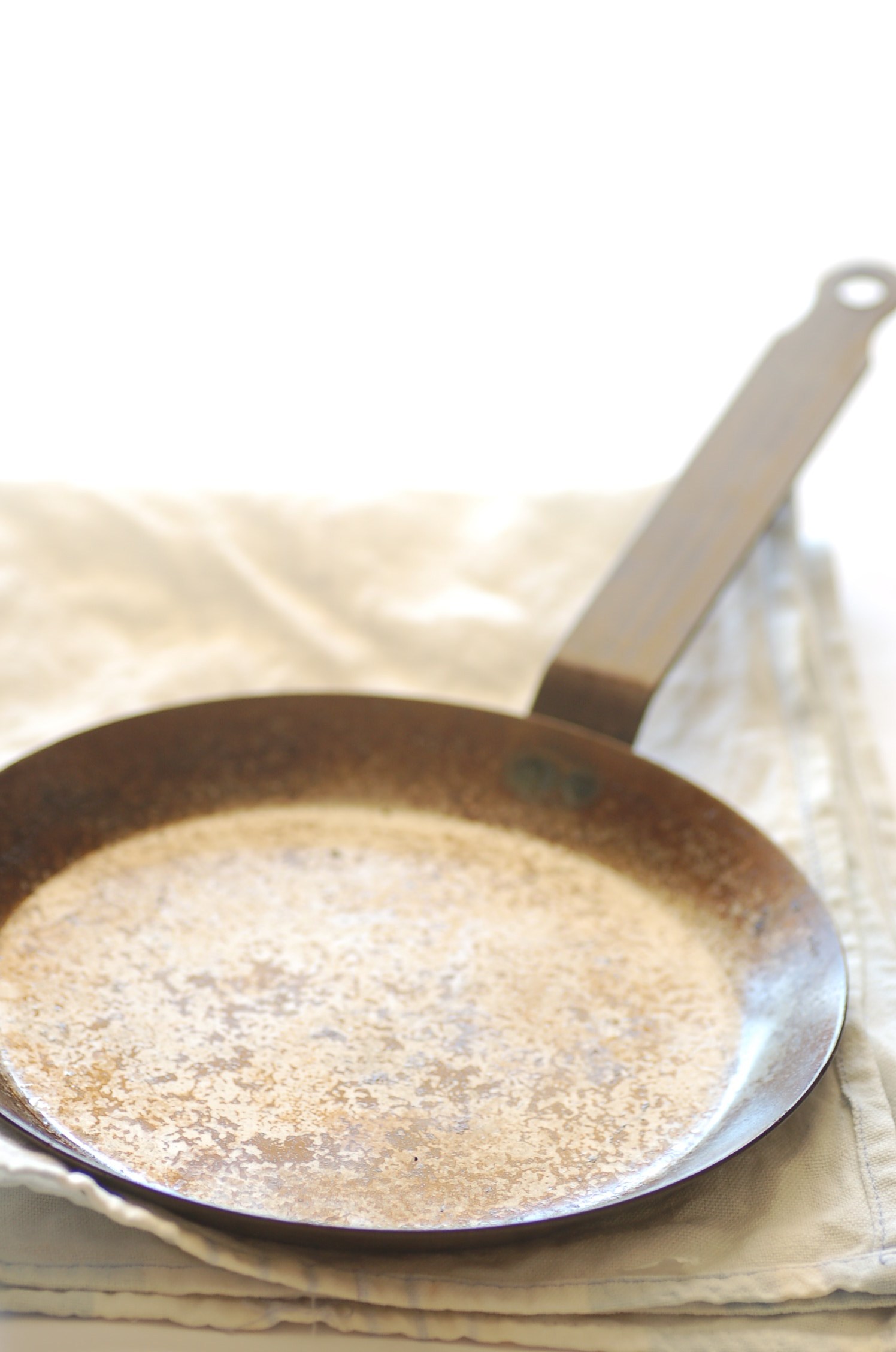 two brown and gold metal plates with handles