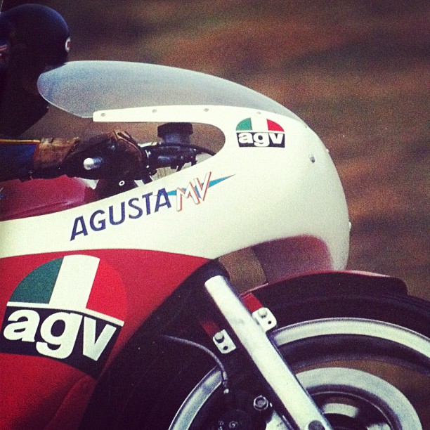 a close up po of an agustat racing motorcycle