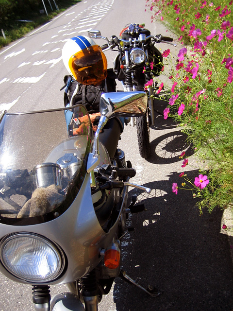 a couple of people that are riding on a motorcycle