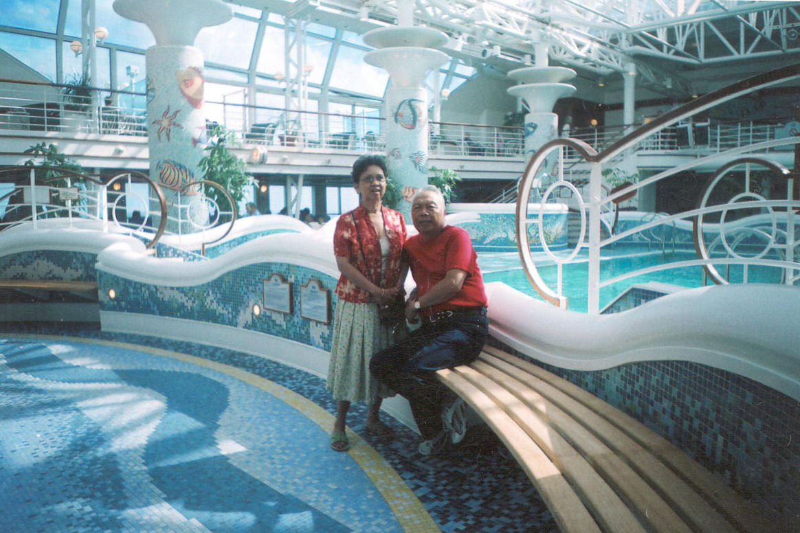 an image of two people that are on a boat