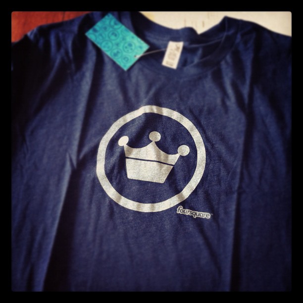 a tee shirt that is printed with a crown