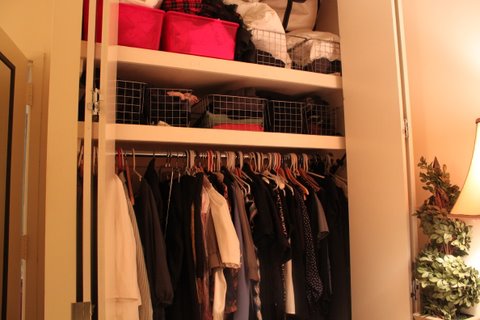 an image of a very clean closet with many items