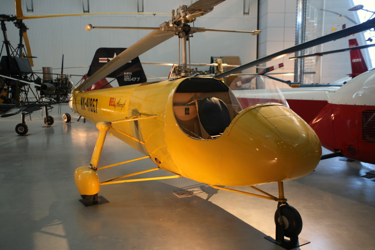 a close up of an old fashioned yellow aircraft