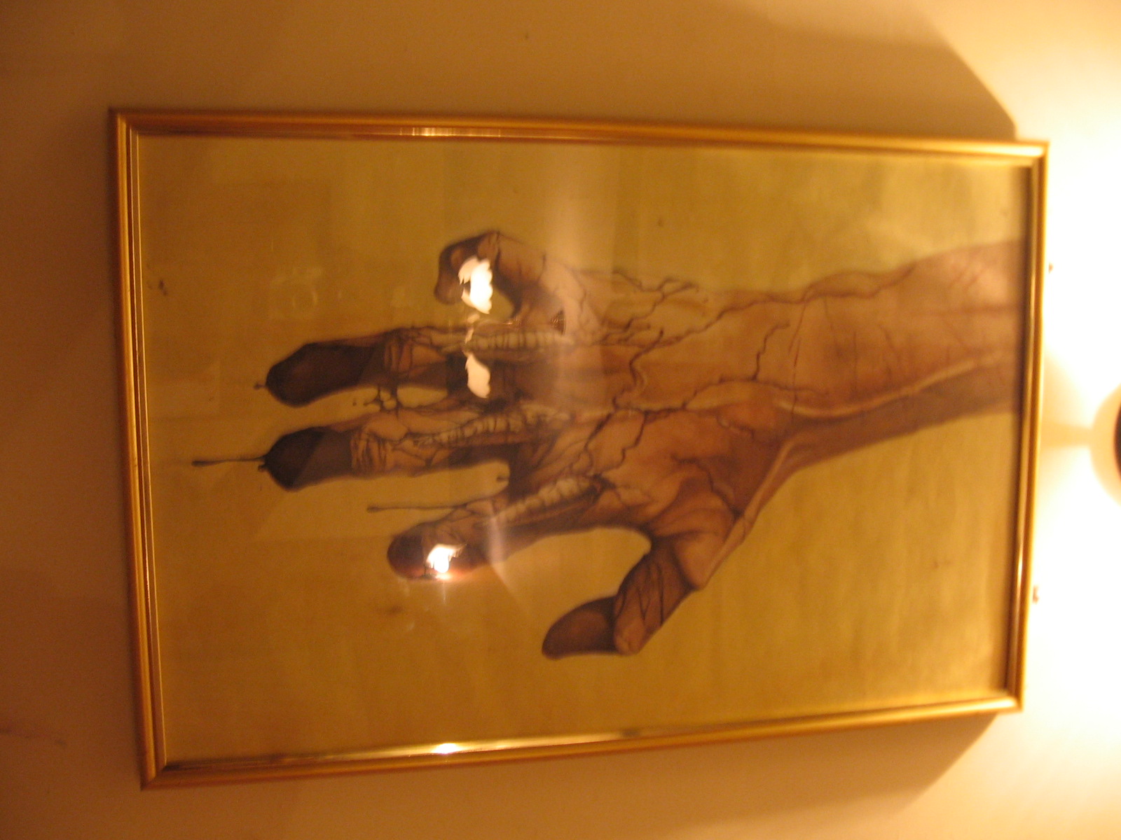 a picture of a hand painted on a wall in a room
