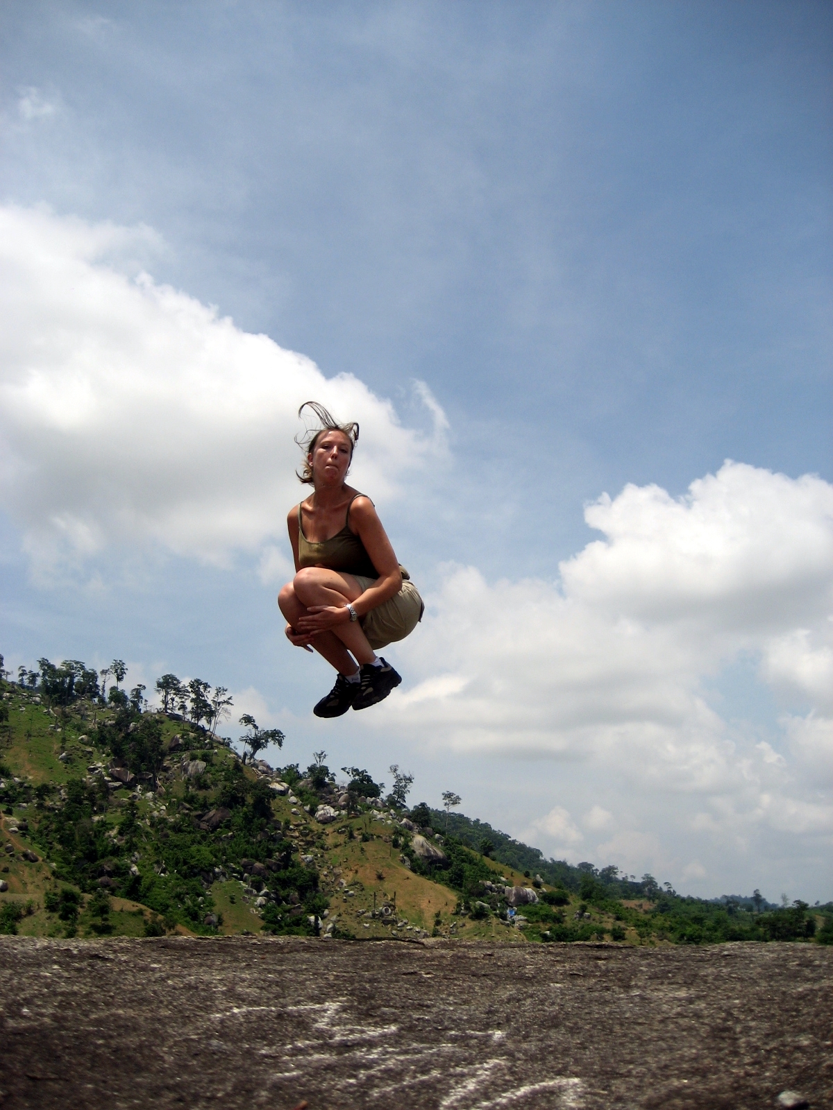 a woman performing a stunt in the air