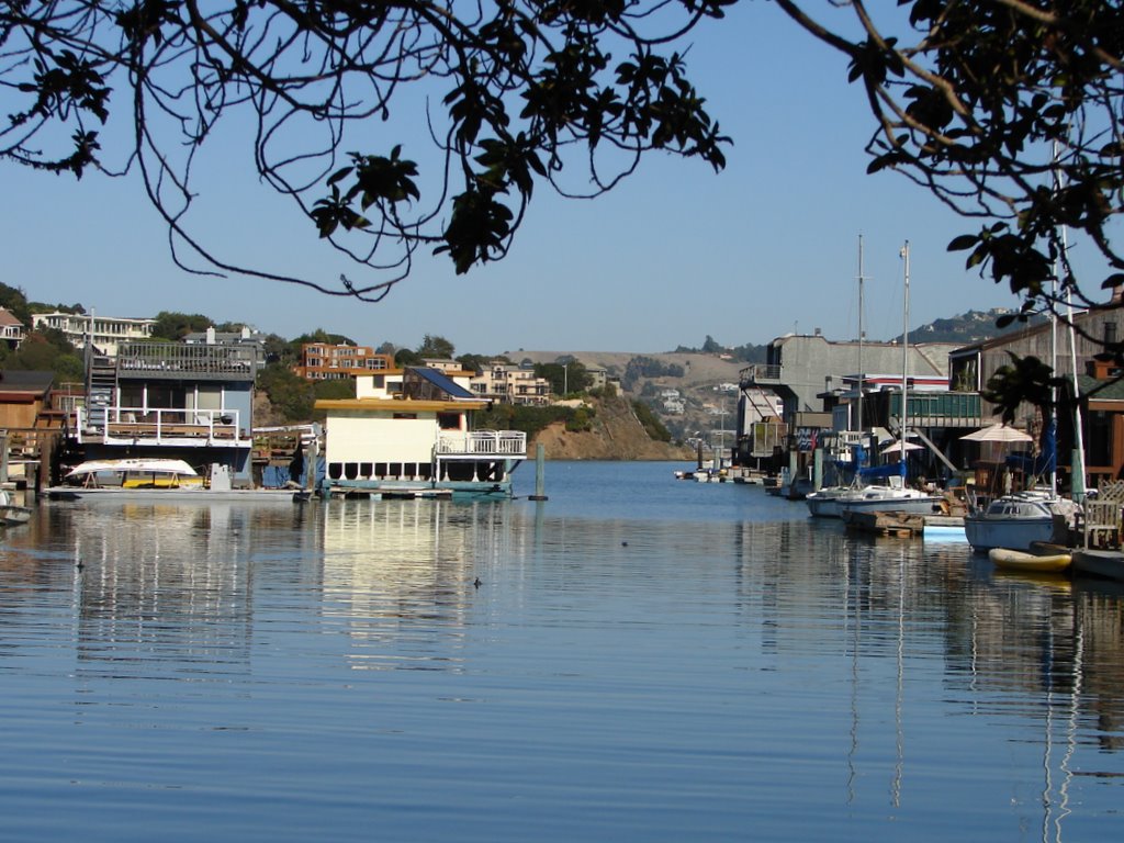 some boats on water are floating in the water