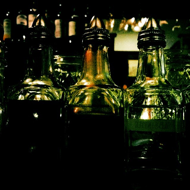 several small bottles sitting next to each other