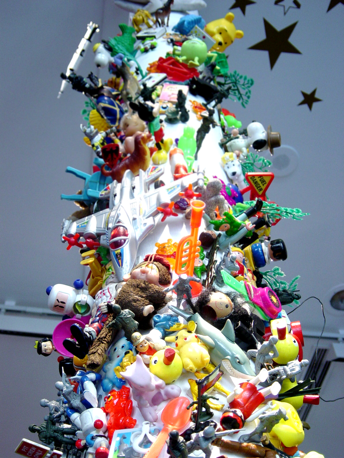 a large pile of toy figurines all over the place