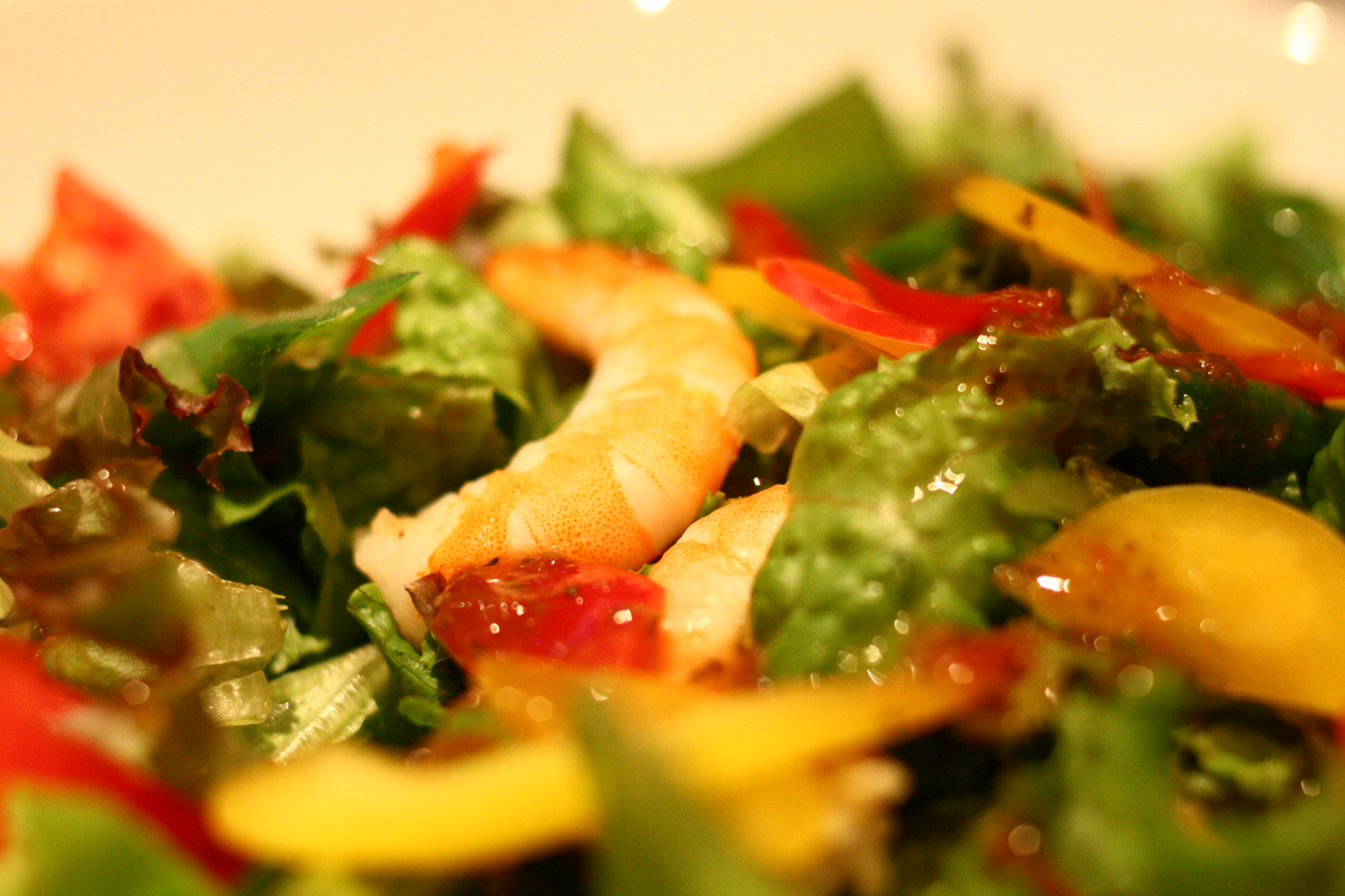 some shrimp and other fresh salad with dressing