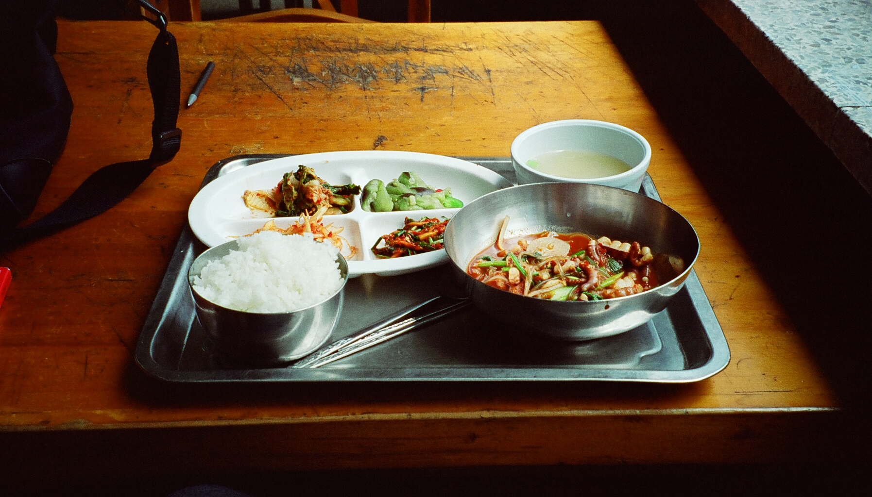 the tray has a lot of plates on it