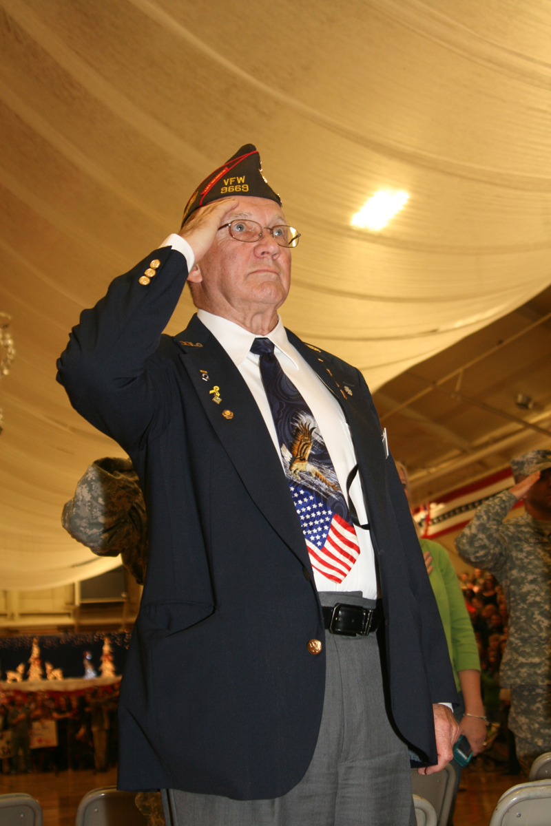 an old man dressed up in his uniform