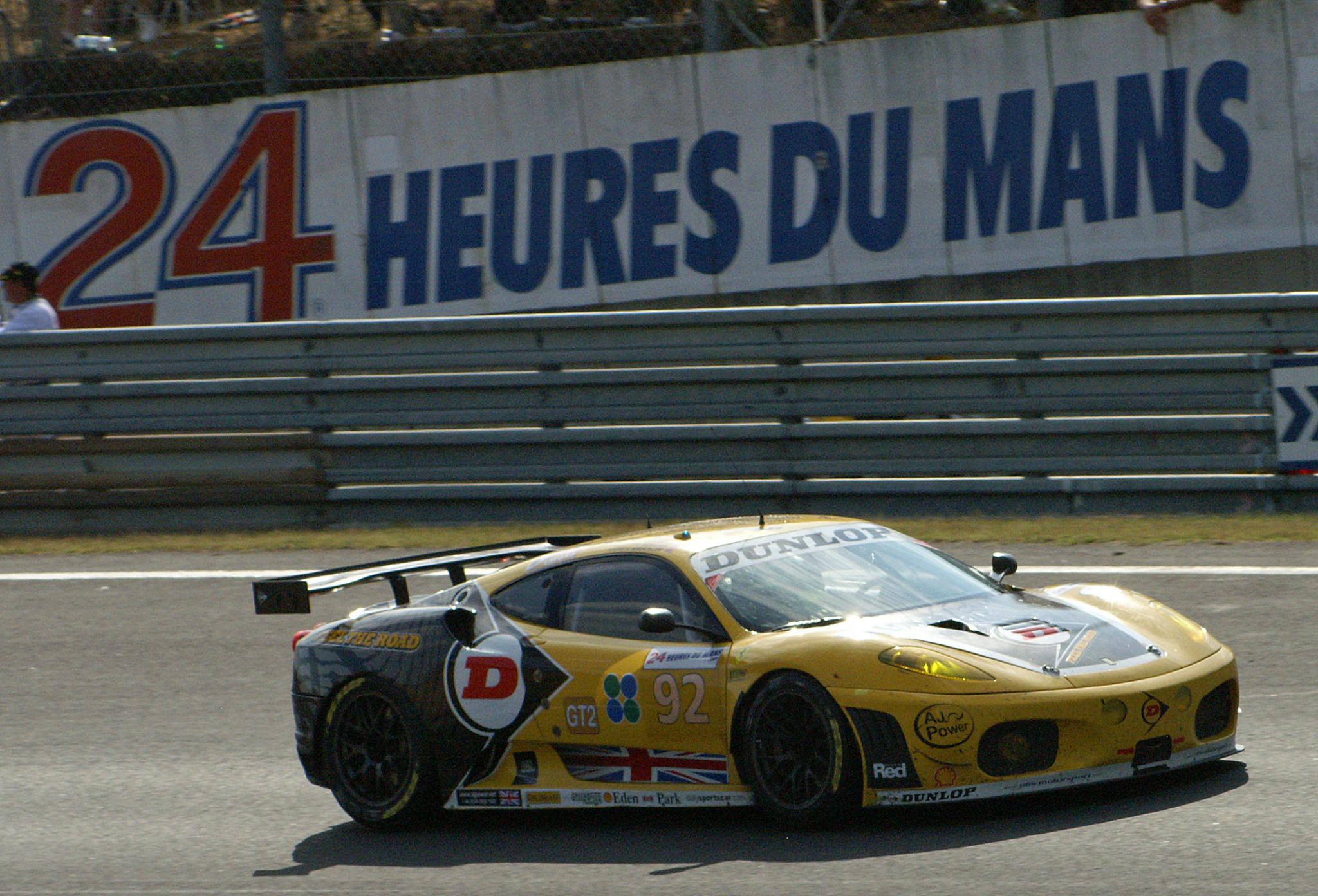 a race car with the number 24 heness du manne