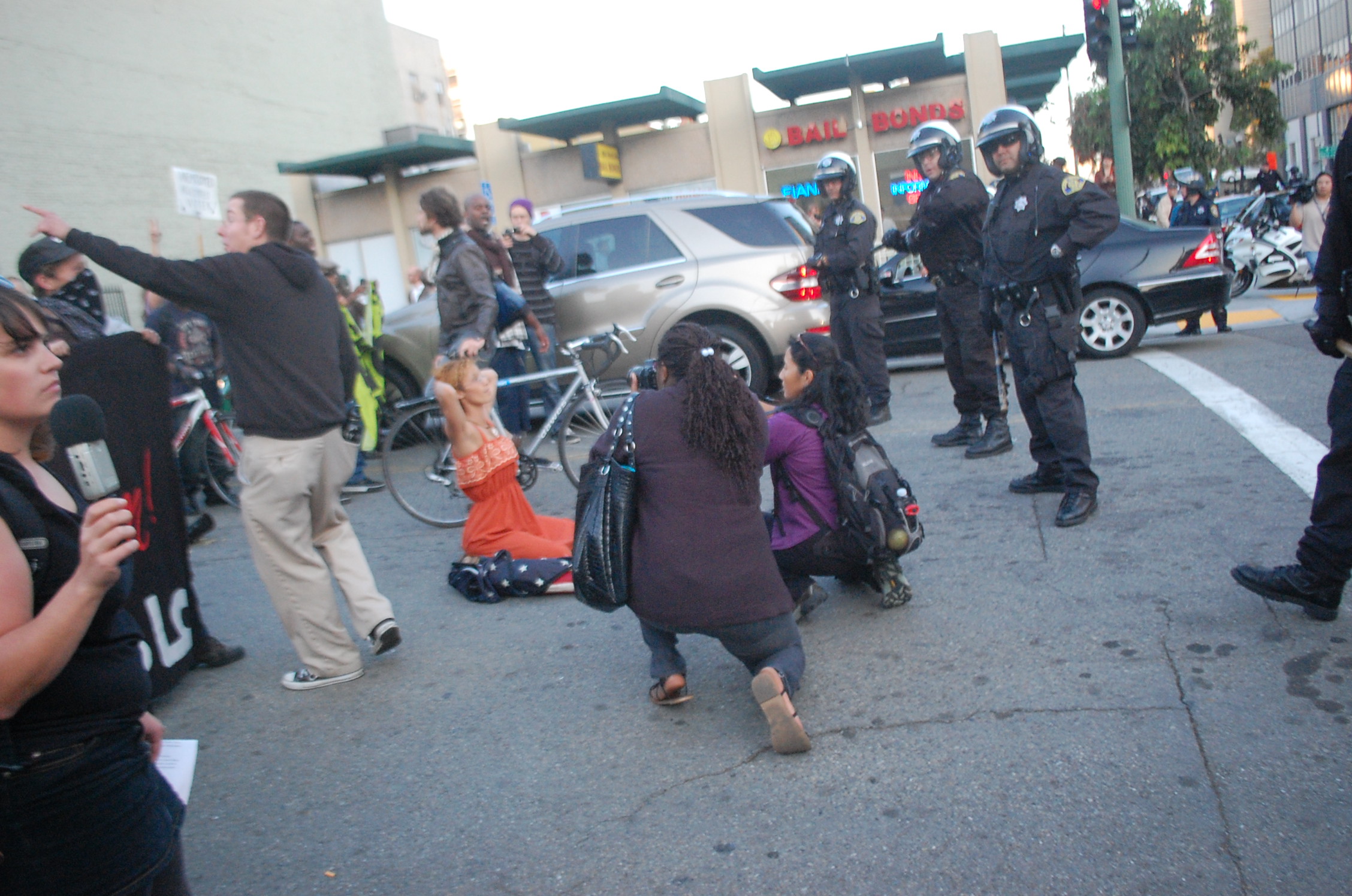 police on the street with people around them