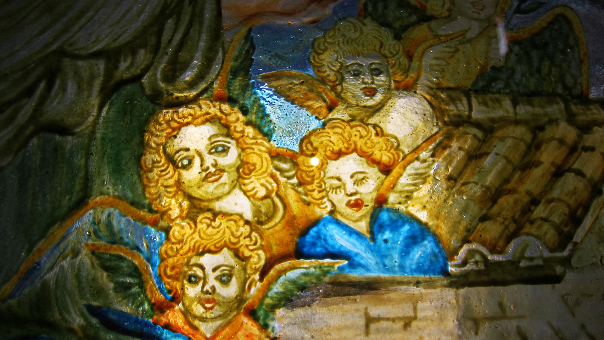the painting depicts many angel on either side of the wall