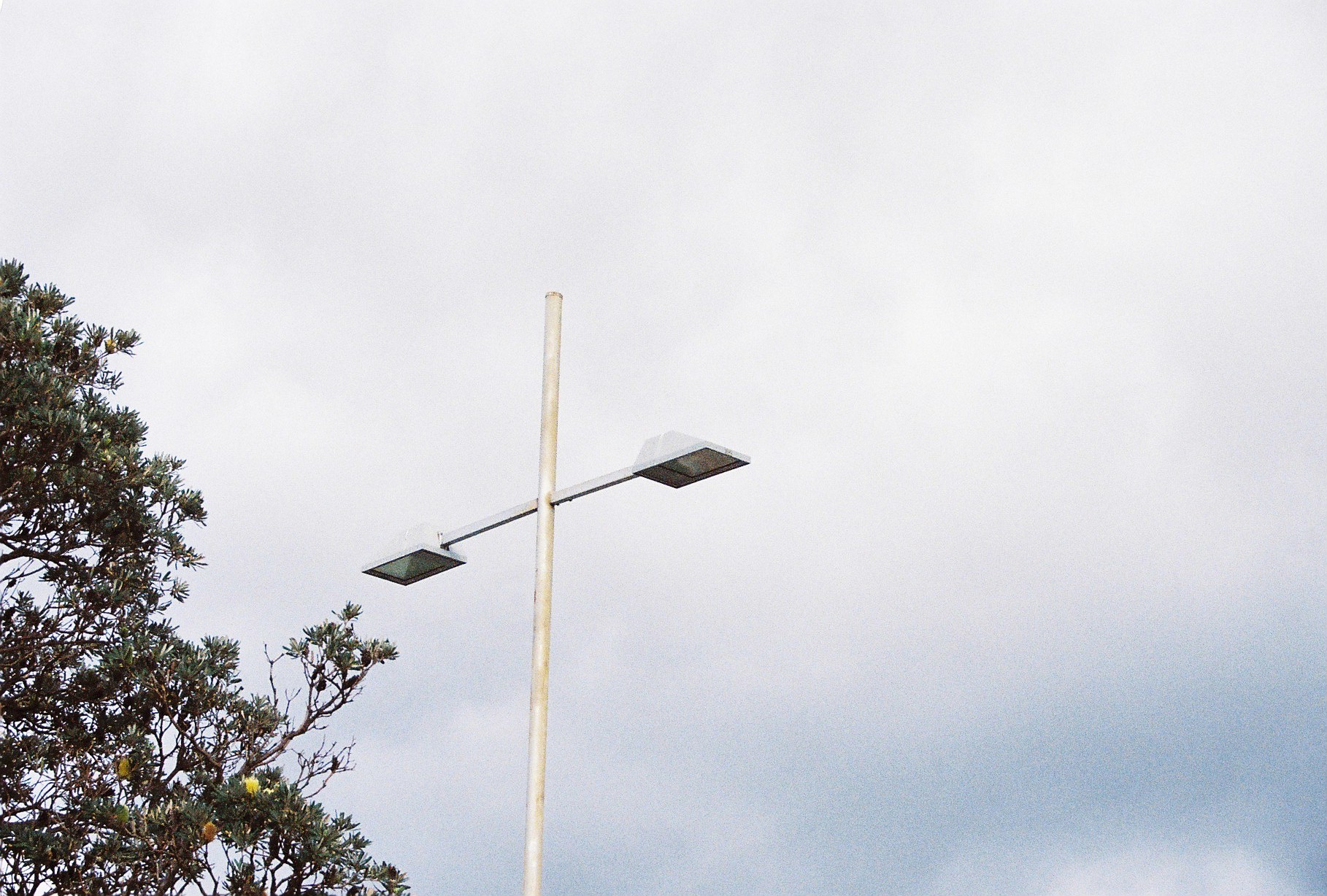 a streetlight that has two lights on it