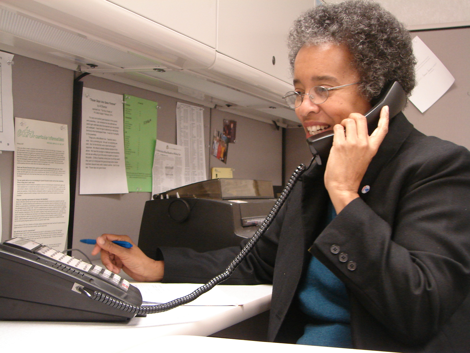 an office worker is talking on the phone