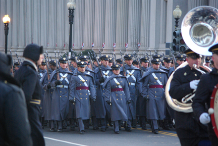 a band playing music while marching down the street