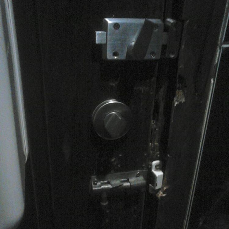 an open door with a metal handle