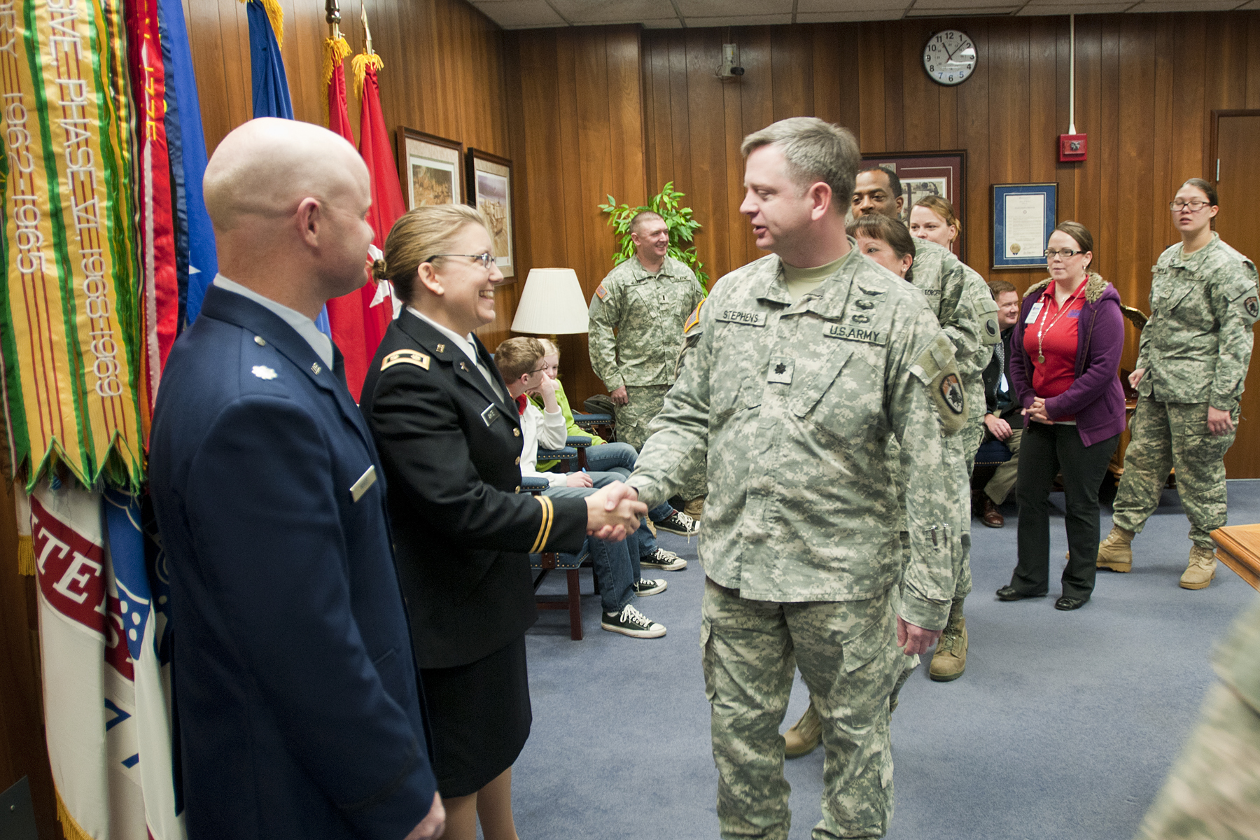 military officers are talking in the meeting room