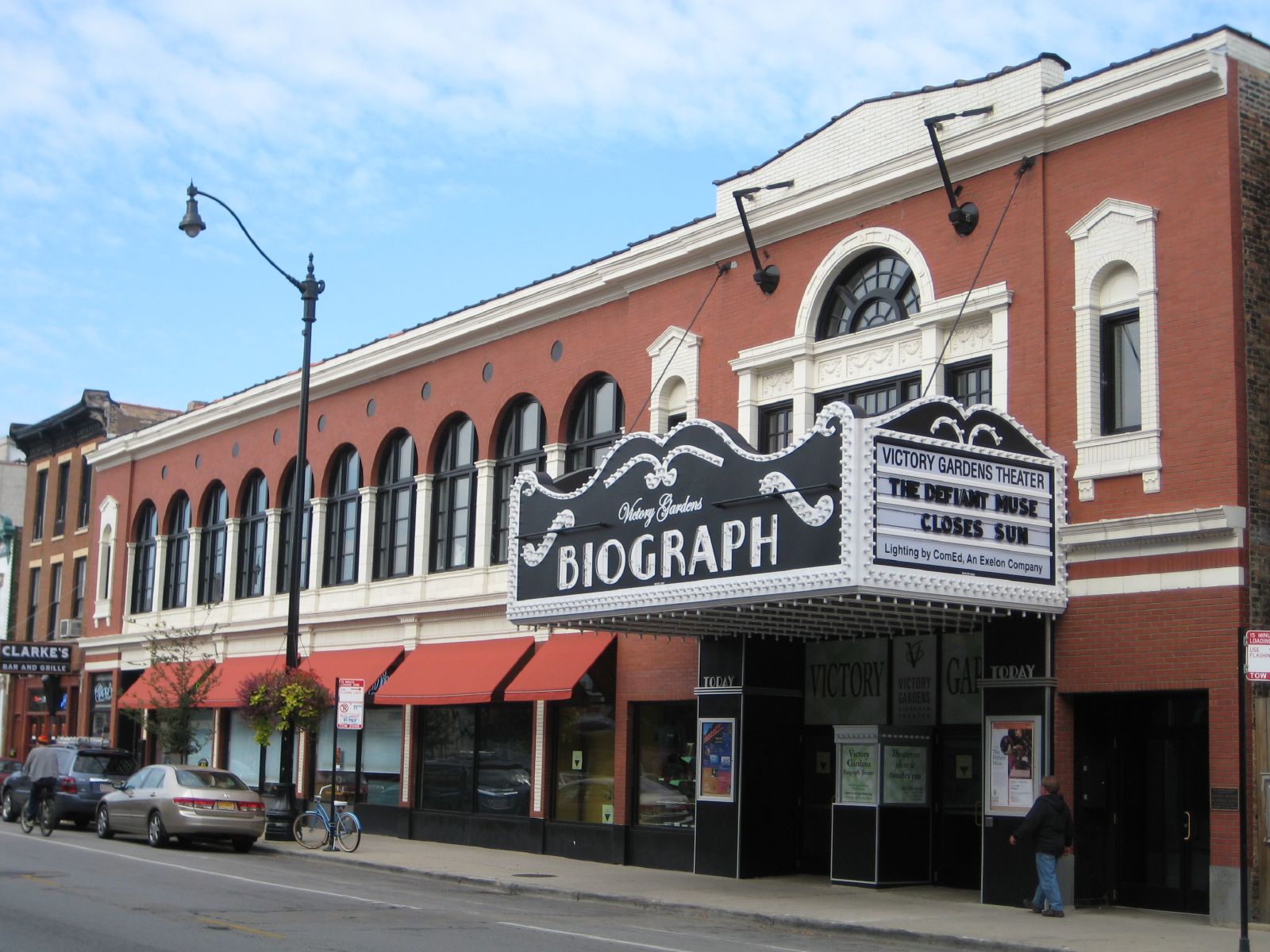 a movie theater in the middle of the city