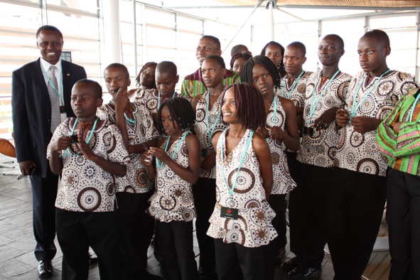 a group of people posing together for the camera