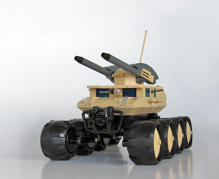 a toy vehicle with wheels that has two large missiles on top of it