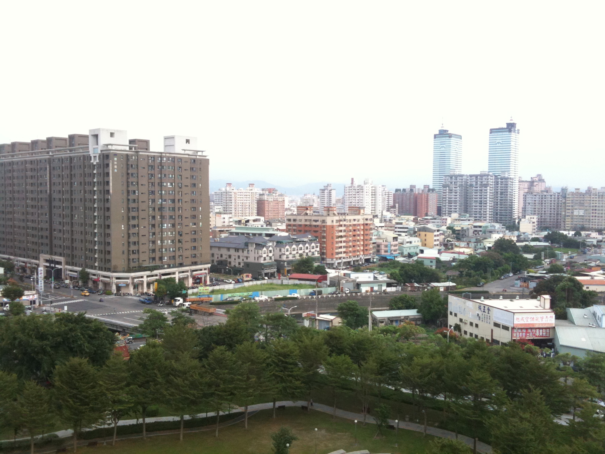 a large skyline in the city with lots of tall buildings