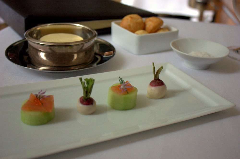 food and condiments on a table with a white background