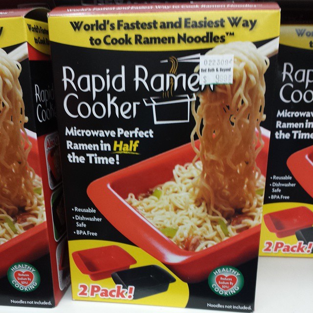 a close up of three boxes of ramen noodles