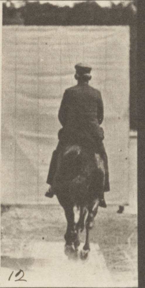 an old po shows a person on a horse