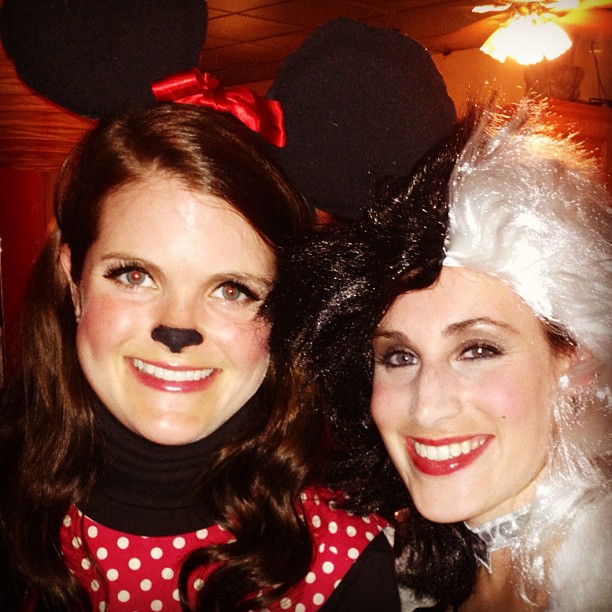 two women with white hair and mickey ears
