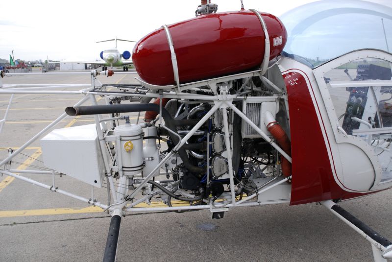 a airplane engine with two engines sitting in the middle of the ground