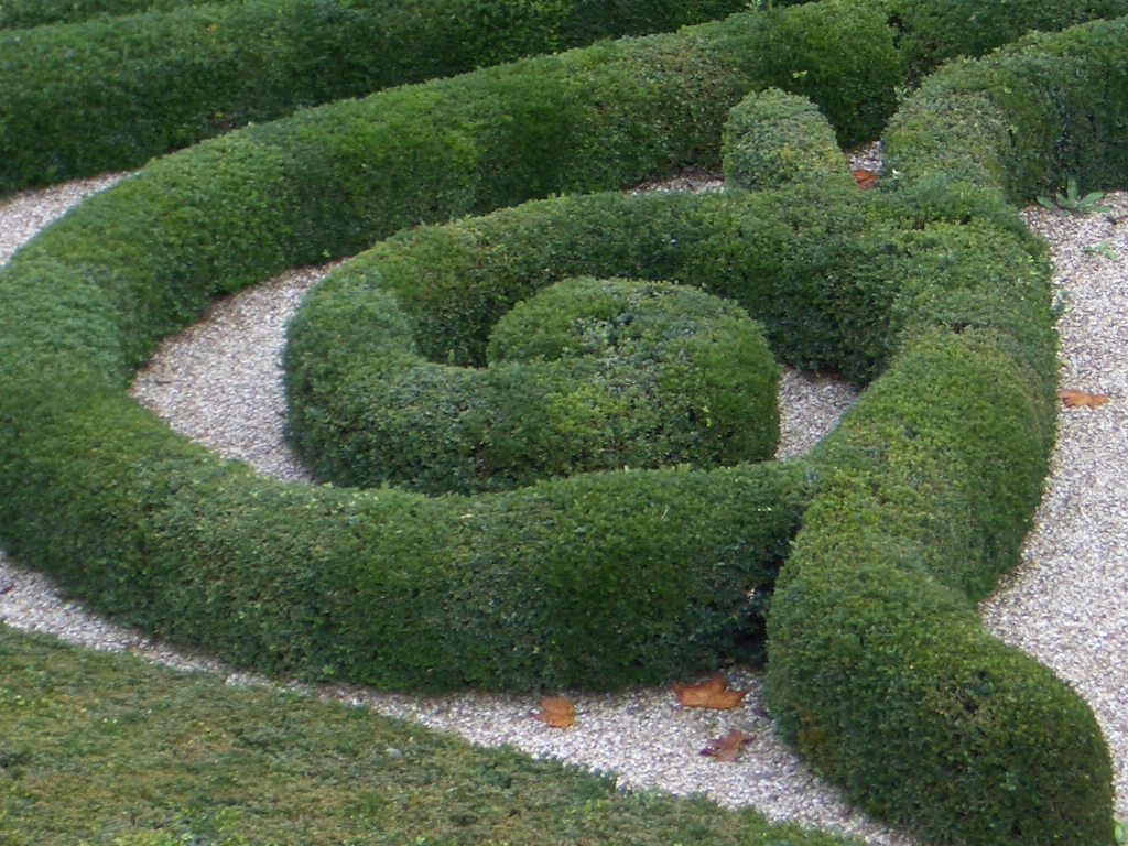 a large garden shaped like a spiral driveway