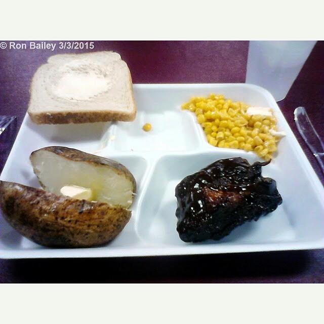 a tray filled with bread and other foods