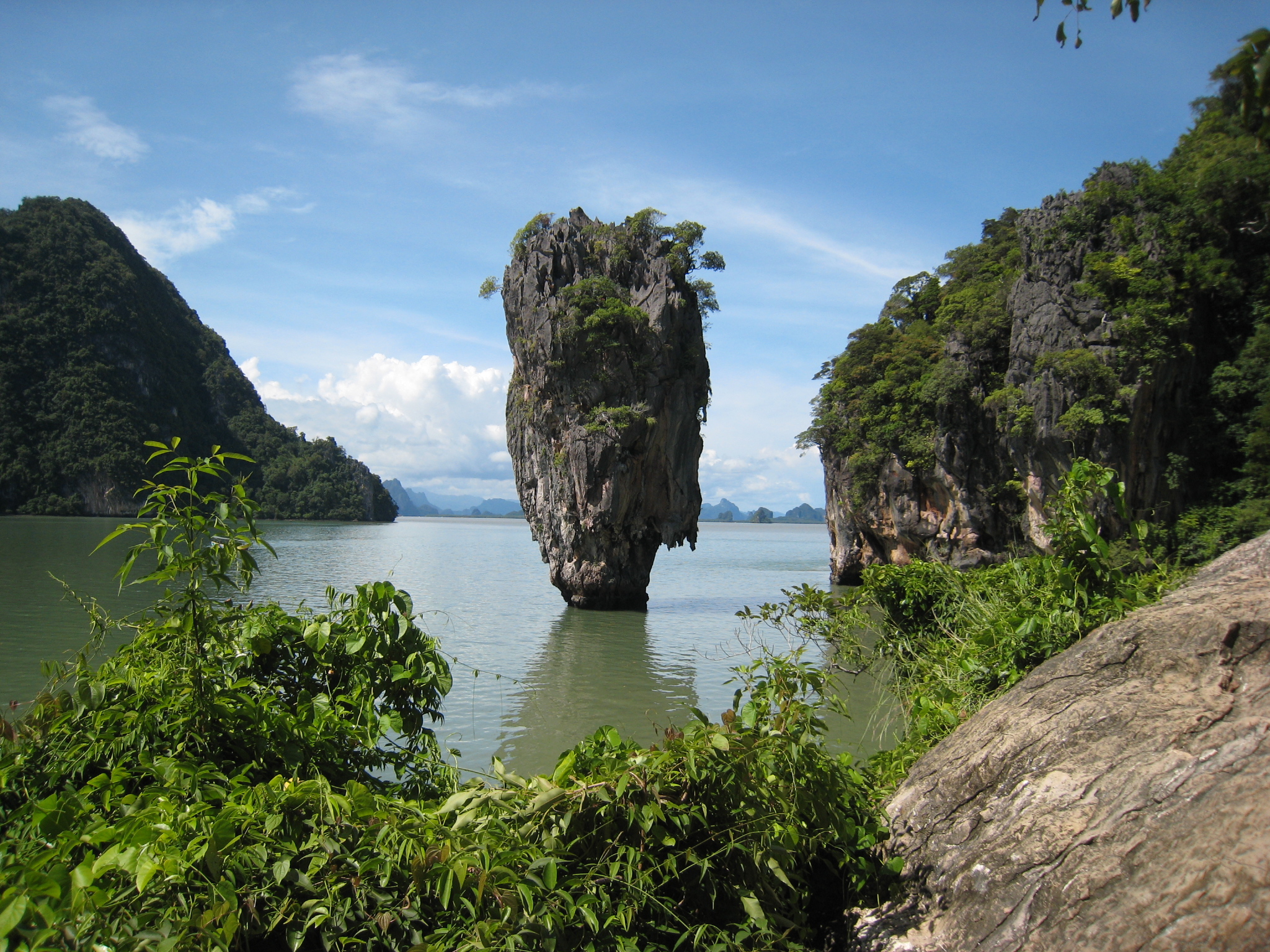 the view from an island surrounded by a large body of water