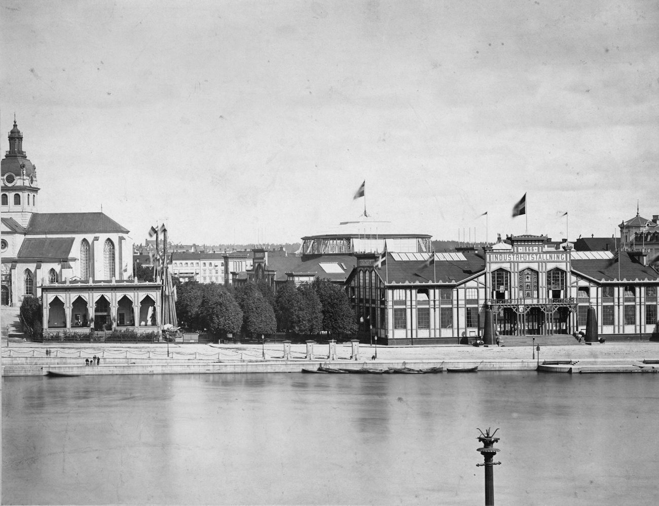 old picture of a city building with water