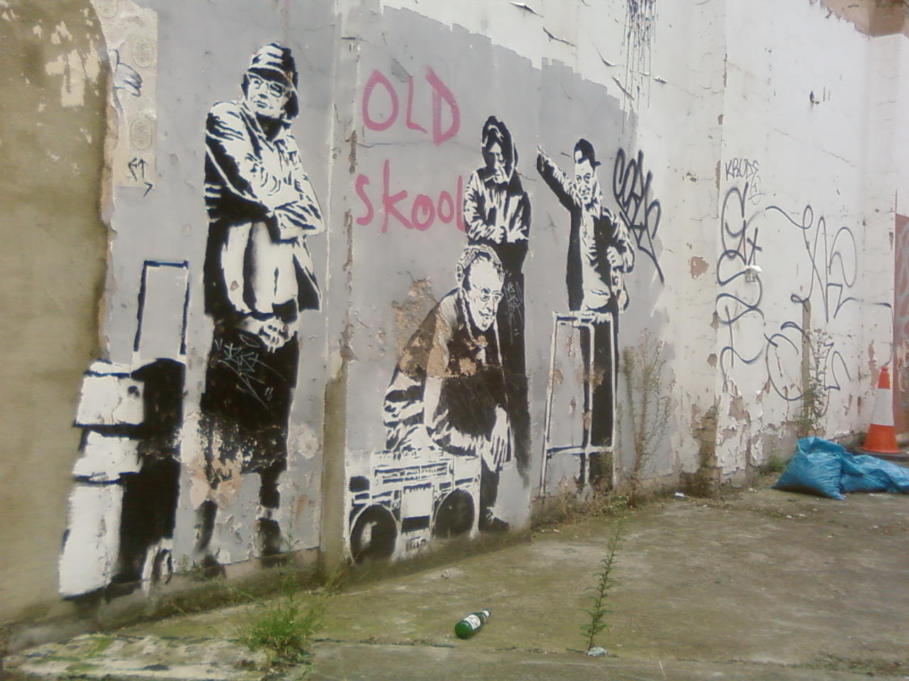 graffiti on an old wall of a street