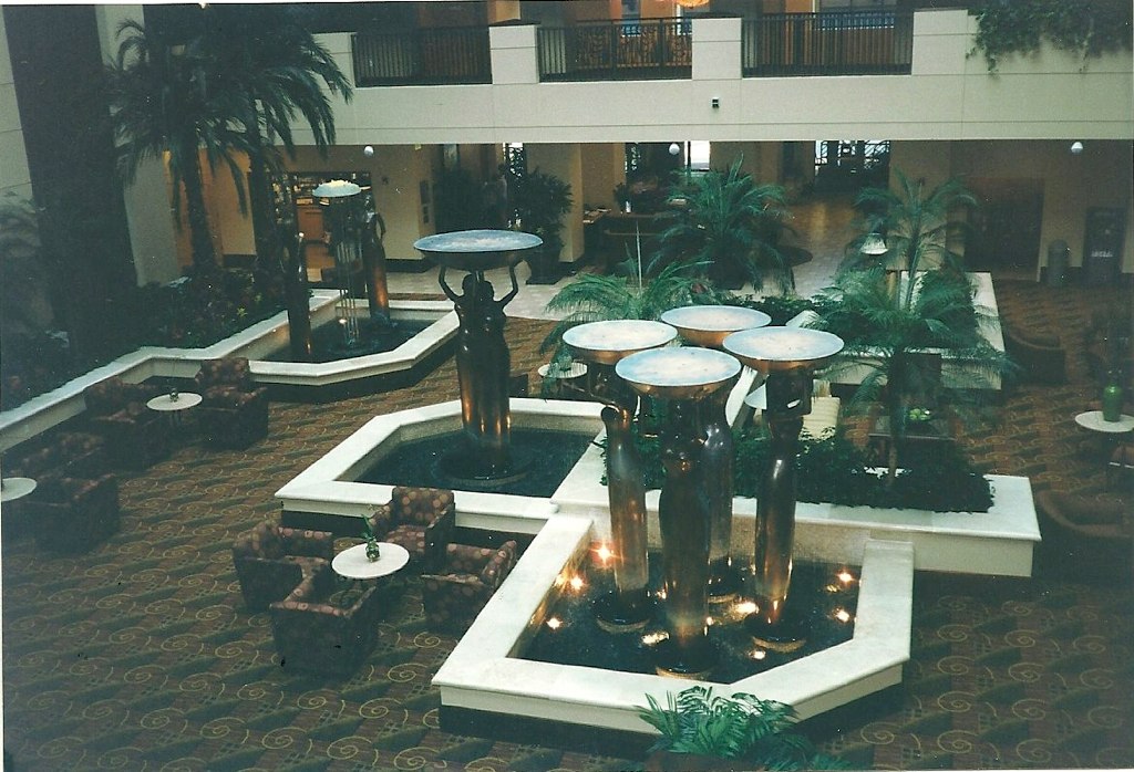 the el lobby has a fountain and sitting area