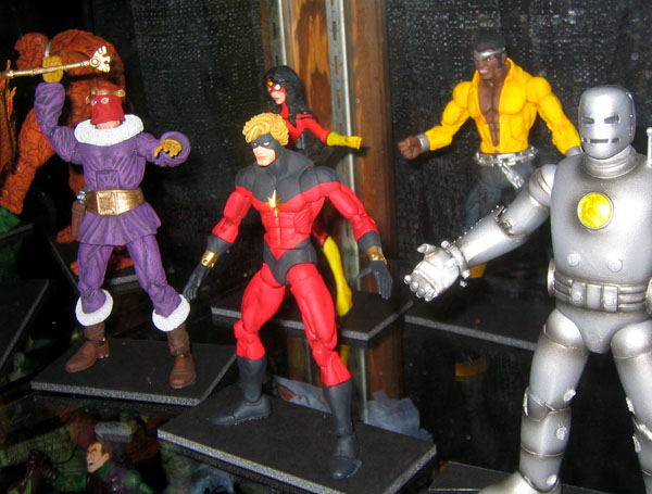 several action figures of all different types standing on display
