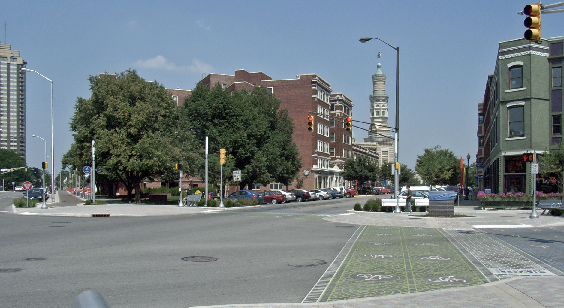 the city street is full of parked cars