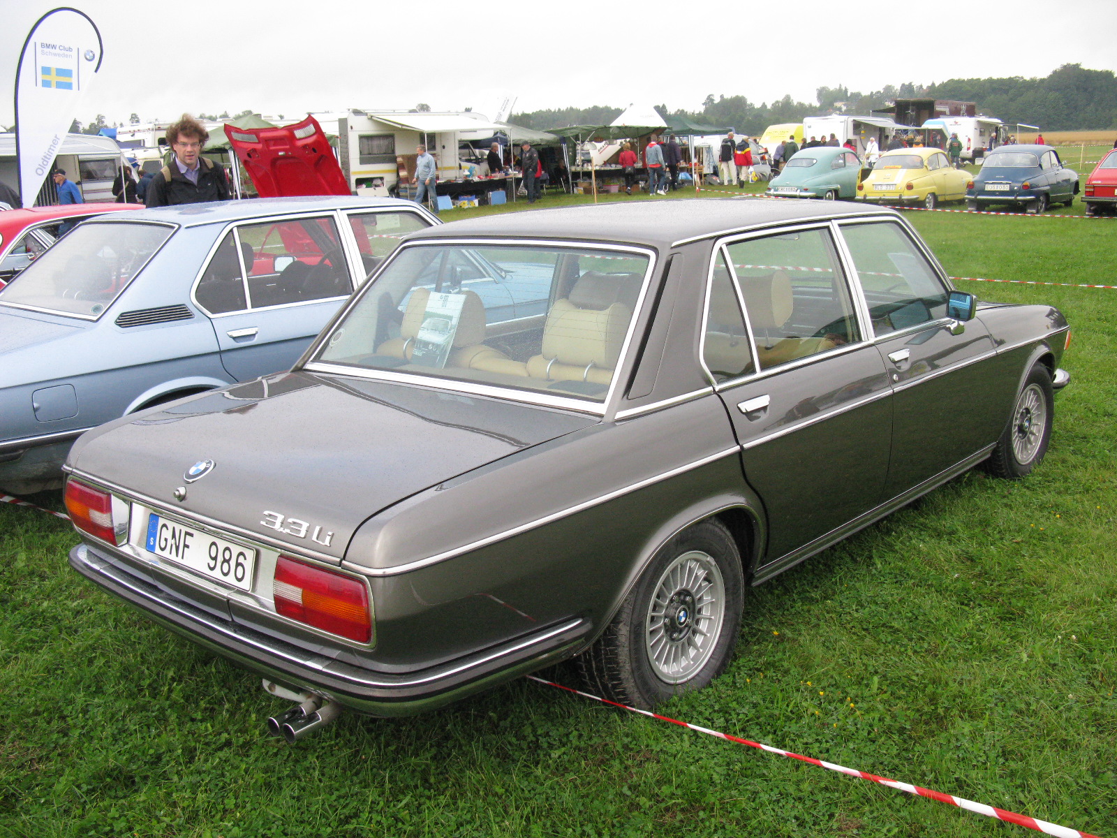 an antique bmw on display in a show