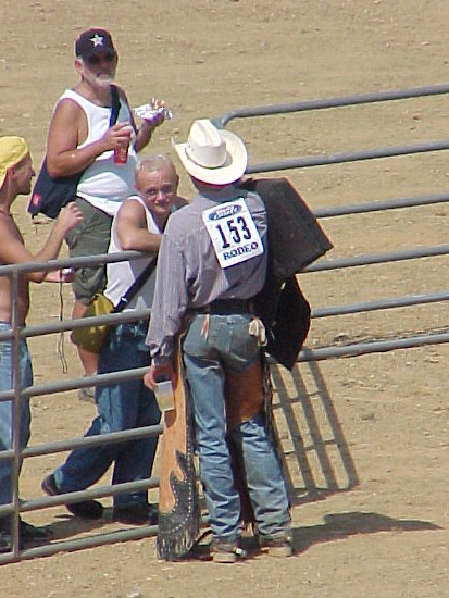 a group of men wearing cowboy hats standing next to each other